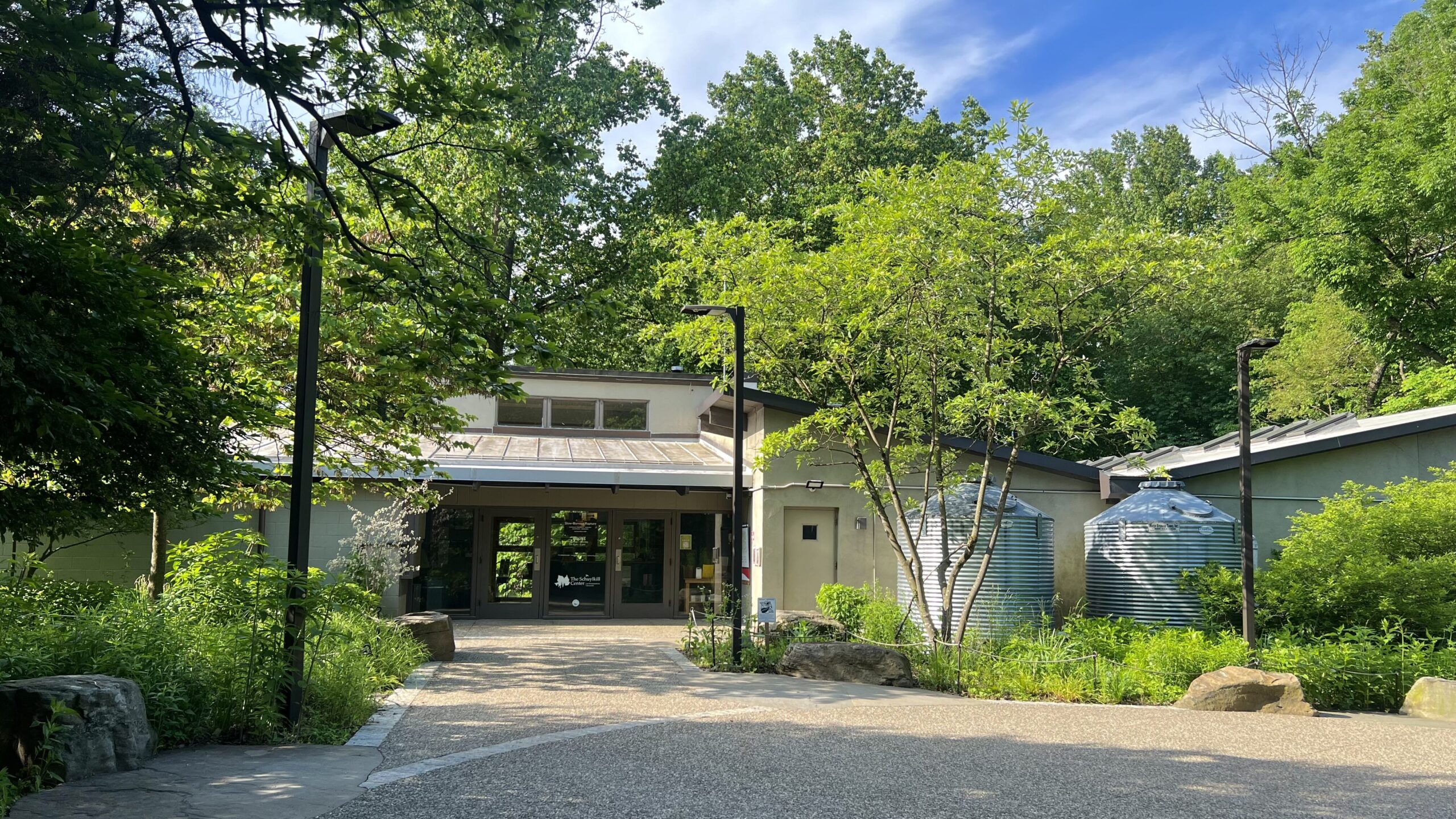 The Visitor's Center building for the Schuylkill Center on a summer day. 